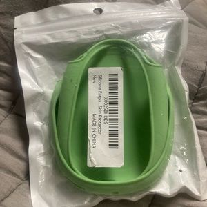 Sage green silicone AirPod protector for the airpod max